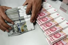 Trung Quốc tăng giá NDT mạnh nhất 4 tháng