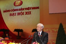 Tổng Bí thư Nguyễn Phú Trọng đọc diễn văn bế mạc Đại hội Đảng toàn quốc lần thứ XII. Ảnh: TTXVN