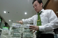 Chưa thể chấm dứt tín dụng ngoại tệ