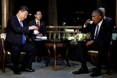 Chủ tịch Trung Quốc Tập Cận Bình (trái) và Tổng thống Mỹ Barack Obama thưởng trà sau cuộc gặp song phương trước thềm hội nghị G20 ở Hàng Châu. Ảnh:Reuters