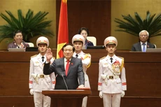 Tân Chánh án Nguyễn Hòa Bình tuyên thệ nhậm chức. Ảnh: Giang Huy.