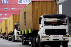 WTO dự đoán lưu lượng các container tới các cảng lớn trên thế giới sẽ tăng. Nguồn: AFP