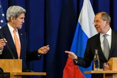 Ngoại trưởng Mỹ John Kerry (trái) và người đồng cấp Nga Sergei Lavrov tại cuộc họp báo chung ở Geneva ngày 8/9. Ảnh: AFP