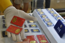 Thị trường vàng trong nước dư cung thiếu cầu. Ảnh: Lệ Chi.