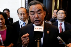 Bộ trưởng Ngoại giao Trung Quốc Vương Nghị nhờ Mỹ giúp đỡ để đàm phán với Philippines. Ảnh: Reuters.