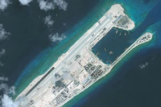 Hoạt động bồi đắp phi pháp của Trung Quốc trên một bãi đá thuộc chủ quyền Việt Nam ở Trường Sa. Ảnh: CSIS