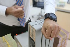 Diễn biến mới của tỷ giá USD/VND nằm trong bối cảnh lãi suất VND có xu hướng tăng lên - Ảnh: Quang Phúc.