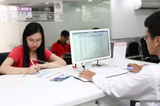 Dự án Hệ thống thông tin quản lý và hiện đại hóa ngân hàng có tổng vốn đầu tư là 71,83 triệu USD. Ảnh: Nhã Chi