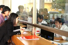 Dù môi trường kinh doanh đã được cải thiện nhưng vẫn còn nhiều vấn đề khiến doanh nghiệp bức xúc. Ảnh: Tiên Giang