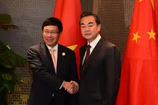 Phó thủ tướng, Bộ trưởng Ngoại giao Phạm Bình Minh (trái) và ông Vương Nghị, Bộ trưởng Ngoại giao Trung Quốc. Ảnh: fmprc.gov.cn.