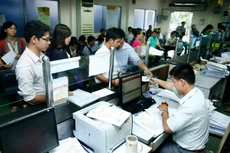 4 tháng đầu năm nay có 34.721 DN mới ra đời nhưng cũng có hơn 25.135 DN tạm ngừng hoạt động, giải thể. Ảnh: Ngô Ngọc Anh