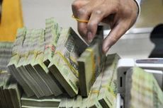 Chỉ tính riêng ba ngân hàng lớn Vietcombank, VietinBank và BIDV, tổng nguồn vốn huy động đã lên tới hơn 1,5 triệu tỷ đồng.