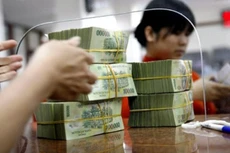 “Cuối năm 2015, tỷ lệ nợ xấu ước tính còn khoảng 2,5%“