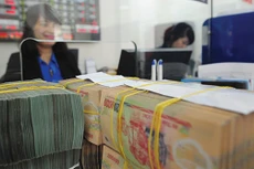 Thị trường đang rất dư tiền khi lãi suất liên ngân hàng qua đêm chỉ từ 0,5-1%/năm
