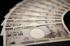 Một chuyên gia về thị trường tiền tệ tại ngân hàng Commerzbank, Frankfurt nhận định khả năng Ngân hàng Trung ương Nhật (BOJ) can thiệp hạ giá đồng Yên là không cao - Ảnh: WSJ.