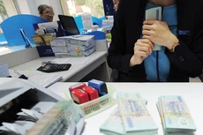 Kỳ kèo cổ tức tiền mặt, cổ đông ngân hàng chỉ nhận mức... tượng trưng