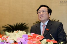 Viện trưởng Viện Kiểm sát nhân dân Tối cao Nguyễn Hoà Bình trình bày báo cáo trước Quốc hội