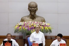 Thủ tướng Nguyễn Xuân Phúc chủ trì phiên họp Chính phủ thường kỳ tháng Tư. (Ảnh: Thống Nhất/TTXVN)