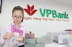 Cơ chế tỷ giá mới đòi hỏi doanh nghiệp phải chuyên nghiệp hơn trong quản trị rủi ro tỷ giá. Ảnh: Tường Lâm