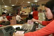 Mới hơn 10% nợ xấu mua về quay trở lại thành tiền thật. Ảnh: Như Ý.