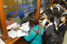 Đánh giá, phân loại người nộp thuế - Ảnh: TTXVN