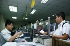 Nhiều cơ quan yêu cầu DN phải có xác nhận ngành nghề đang kinh doanh trong khi luật đã bỏ. Ảnh: Tất Tiên