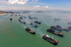 Tàu cá Trung Quốc ra khơi từ tỉnh Phúc Kiến, đông nam Trung Quốc, ngày 1/8/2015. Ảnh: Xinhua.