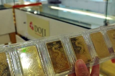 Giá vàng thế giới có thể nhích lên 2 phiên liên tiếp trong hôm nay. Ảnh: Anh Quân