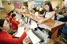 Hệ thống ngân hàng Việt Nam nên giảm số lượng xuống còn 17 ngân hàng