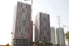 Dự án Usilk City ở Q.Hà Đông, Hà Nội bị chậm bàn giao nhà do quá phụ thuộc vào nguồn vốn ngắn hạn - Ảnh: Lê Quân