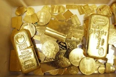 Vàng lại có tuần tăng giá thứ 6 liên tiếp. Ảnh: AFP.