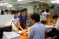 Số tiền nợ thuế năm 2015 vẫn còn tới gần 70.000 tỷ đồng. Ảnh: Lê Tiên