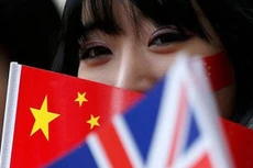 Các công ty Trung Quốc đang đổ tiền làm M&A khắp thế giới. Ảnh: Telegraph