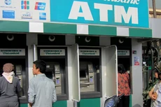 Ngân hàng Nhà nước chỉ đạo bảo đảm đủ tiền mặt cho máy ATM trong dịp Tết. Ảnh: Lê Tiên 