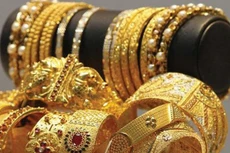 Giá vàng biến động mạnh trong vài phiên gần đây do chờ thông tin cuộc họp chính sách của Fed. Ảnh: Dawn.