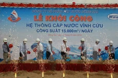 Nghi thức khởi công dự án xây dựng hệ thống cấp nước Vĩnh Cửu. (Ảnh: Sỹ Tuyên/TTXVN)