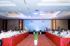 Quang cảnh Hội nghị giữa kỳ đánh giá triển khai Thỏa thuận kế hoạch hợp tác Việt Nam - Lào năm 2024 và rà soát, thúc đẩy Hiệp định hợp tác song phương hai nước giai đoạn 2021-2025