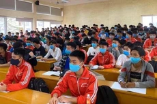 Sinh viên trở lại trường sẽ phải tuân thủ quy định chống dịch nghiêm ngặt. Ảnh: Tiền Phong