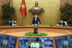 Thủ tướng yêu cầu nhanh chóng tiêm chủng, gỡ ngay ách tắc lưu thông hàng hóa