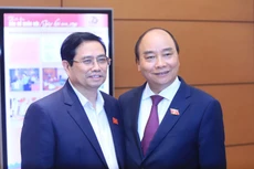 Ủy viên Bộ Chính trị Nguyễn Xuân Phúc và Ủy viên Bộ Chính trị, Trưởng Ban Tổ chức Trung ương Phạm Minh Chính. Ảnh: Vietnamnet