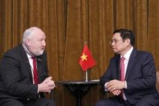 Thủ tướng Phạm Minh Chính tiếp Giáo sư Mohammed Abdel, Hiệu trưởng Đại học Liverpool. Ảnh: TTXVN 