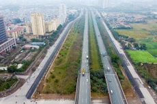 Giá đất các huyện ngoài thành Hà Nội tăng nóng nhờ thông tin sắp sửa lên quận. Trong ảnh là khu vực Đại lộ Thăng Long (Hoài Đức, Hà Nội)