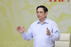 Thủ tướng Phạm Minh Chính chủ trì hội nghị. Ảnh: TTXVN