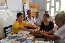 Từ ngày 1/1/2022 sẽ điều chỉnh tăng thêm 7,4% trên mức lương hưu, trợ cấp BHXH. Ảnh minh họa