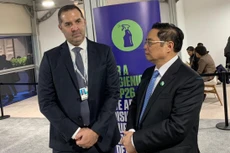 Thủ tướng Chính phủ Phạm Minh Chính và ông Noel Kinder, Giám đốc phát triển bền vững Tập đoàn Nike. Ảnh: VGP