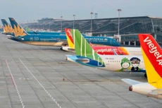 Máy bay của các hãng hàng không tại sân bay Nội Bài. Ảnh: Vietnam+