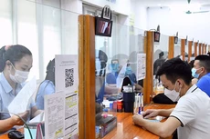 Lao động làm thủ tục về bảo hiểm thất nghiệp tại Trung tâm Dịch vụ việc làm Hà Nội.