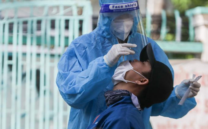 Người lao động tiêm đủ liều vaccine không phải xét nghiệm