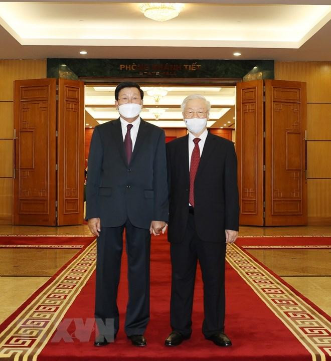 Tổng Bí thư Nguyễn Phú Trọng đón Tổng Bí thư, Chủ tịch nước Lào Thongloun Sisoulith. Ảnh: TTXVN