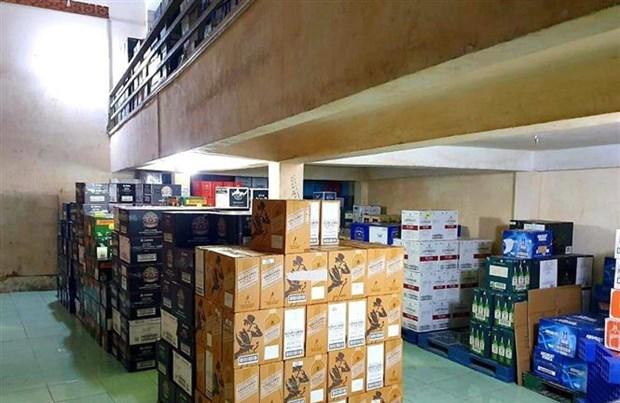 Hàng chục thùng rượu ngoại nhập lậu bị phát hiện tại kho hàng của Công ty Đại Lợi